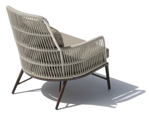 chaise d'extérieur au jardin sur la terrasse en osier