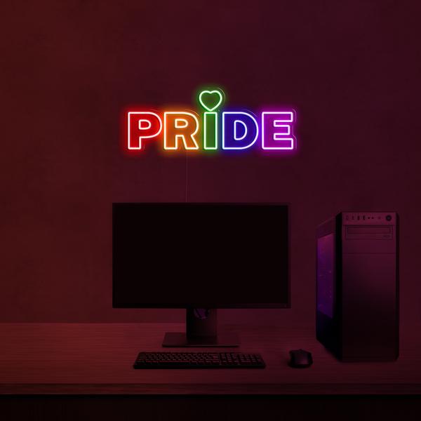 Enseigne LED néon 3D sur un mur multicolore - PRIDE